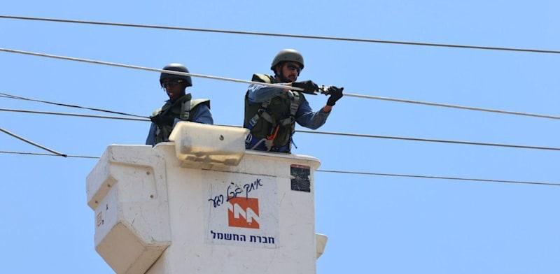 עובדי חברת החשמל / צילום: יוסי וייס, חברת החשמל