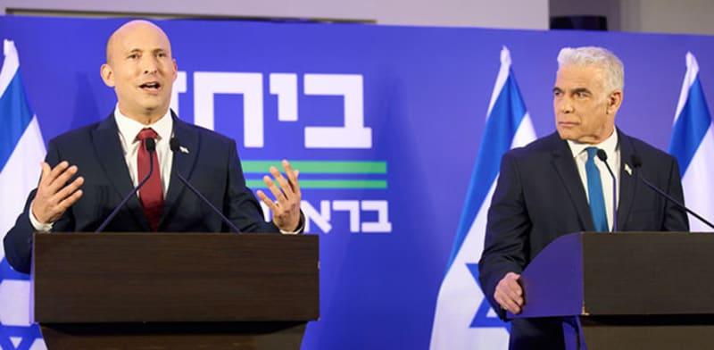 לפיד ובנט בעת ההצהרה על האיחוד / צילום: ap, Ariel Schalit