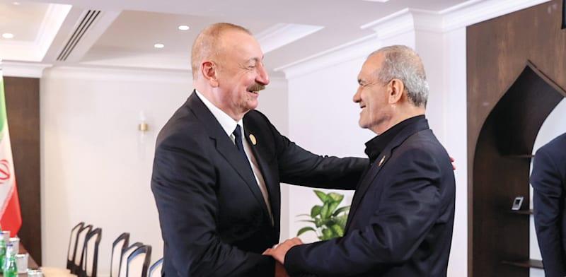 אזרבייג'ן; נשיא איראן מסעוד פזשקיאן (מימין) נפגש עם נשיא אזרבייג'ן אילהם אלייב / צילום: ap, Azerbaijani Presidential Press Office אזרבייג'ן; נשיא איראן מסעוד פזשקיאן (מימין) נפגש עם נשיא אזרבייג'ן אילהם אלייב / צילום: ap, Azerbaijani Presidential Press Office